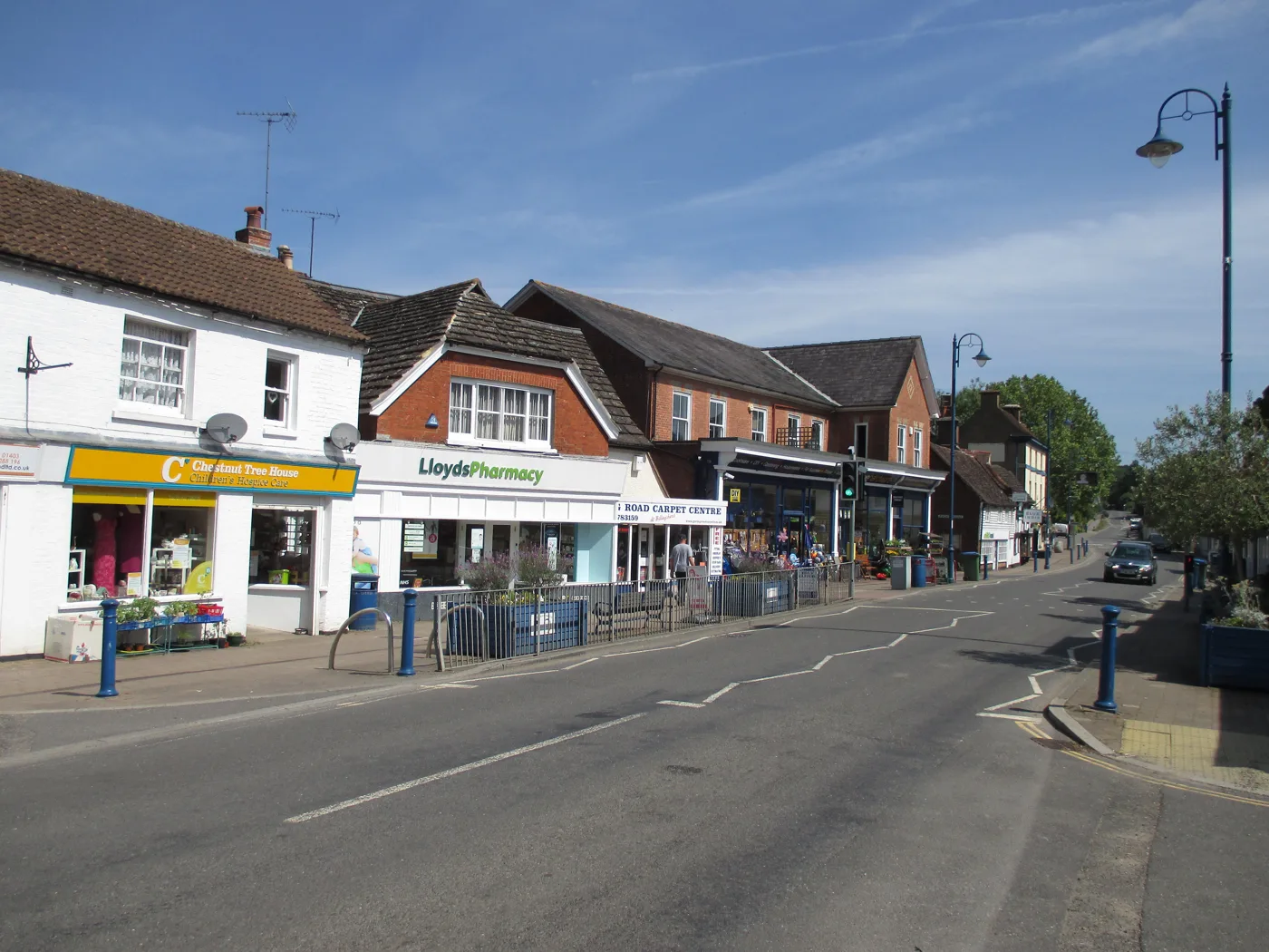High Street, Billingshurst, one of the three villages where the empty homes are. The council has not named the properties, and this photograph does not show them.