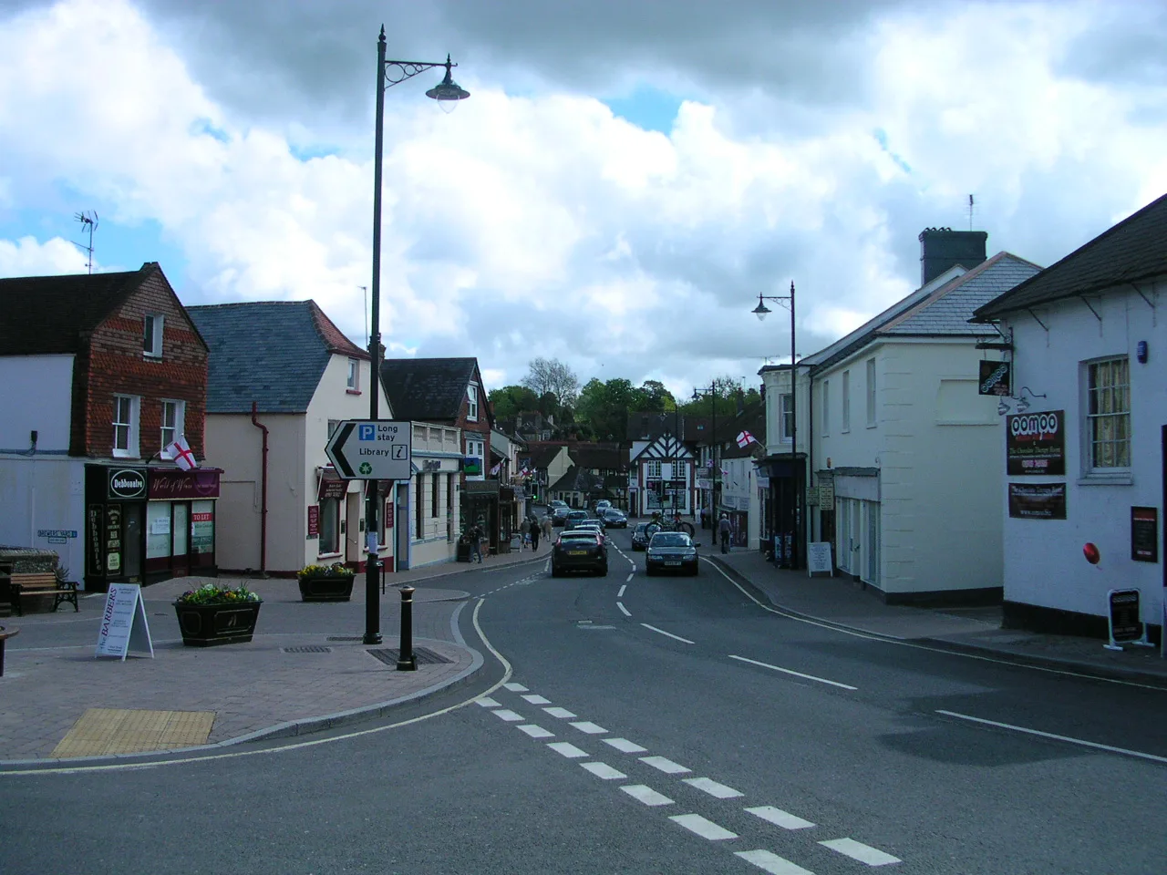 The High Street in Storrington, whose recreation hub is the largest single allocation. This photograph shows the village centre; it does not show the hub site.